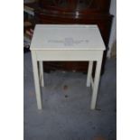 A child's painted pine desk.