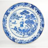 A large Chinese blue and white 19th century charger, depicting figure in landscape. A/F