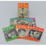 A group of Elvis Monthly magazines numbered 122, 134, 166, 85, 89 and others.