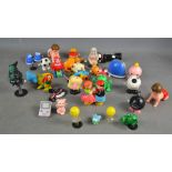 A group of 1970s and vintage wind up toys.