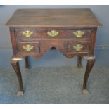 An 18th century oak lowboy. 70cm high x 74cm wide x 46cm