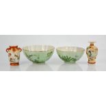 A group of Chinese and Japanese porcelain to include two bowls and two miniature vases 7cm high.