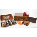 A vintage leather clad toddy glass case, a leather cigarette case, gents travelling set, and