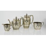 A silver plated James Reid of Glasgow four piece Zodiac tea service retailed by Sorley's of Glasgow,