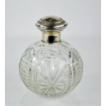 A cut glass and white metal rosewater flagon, 14cm high.