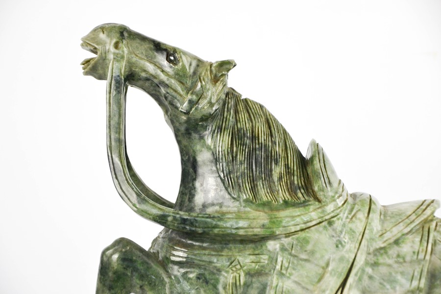 An early 20th century Chinese soapstone horse on wooden stand, 37cm high. - Image 2 of 3