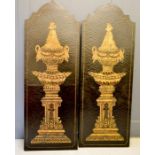 A pair of decorative painted panels depicting gold urns on a black crackle glazed ground, 165cm by