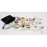 A group of rings to include silver examples, two crystal set bracelets, a ballerina pendant necklace