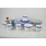 A Royal Stafford bone china part tea service together with a Poole pottery Otter , Sowerby pottery