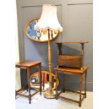 An oak standard lamp, two oak occasional tables, a magazine rack and two oval mirrors