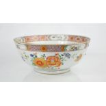 A 19th century Chinese enamelled bowl, depicting floral groups, and having an inner and outer