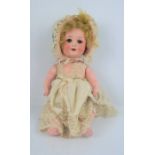 An Armand Marseille German porcelain head doll, No 996, A2/0M