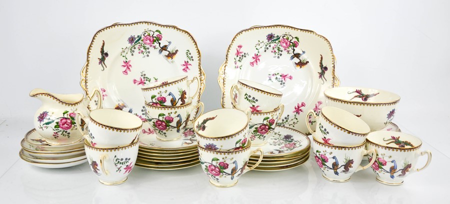 A Paragon china part tea service, comprising milk jug, cups and saucers, cake plates, slop bowl, and