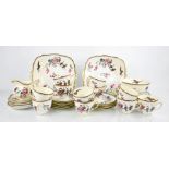 A Paragon china part tea service, comprising milk jug, cups and saucers, cake plates, slop bowl, and