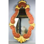 An antique gold painted and fabric lined scroll work wall mirror, 105 by 66cm.