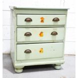 A small pine painted chest of drawers, Victorian, with three drawers, raised on bun feet, 80 by 68