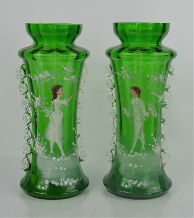 A pair of bohemian glass vases, hand painted with enamelled figures.27.5cm