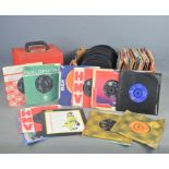 A group of 7" single records to include The Scaffold, Elvis Presley, The Vapors, The Who and many