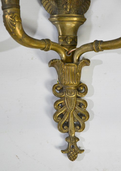 A set of four Empire style brass wall lights, each with twin branches, and the backs cast with - Bild 3 aus 3