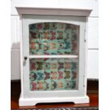 A painted pine cabinet with glazed door and single shelf, 55cm by 42cm by 18cm together with a