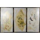 A set of three 19th century framed Chinese paper fans, each hand painted with flowers, and one