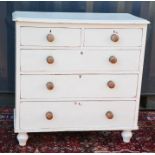 A pine Victorian chest of drawers with two short over three long graduated drawers, painted cream,