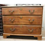 A 19th century mahogany chest of drawers, the three long drawers with brass swan neck handles and