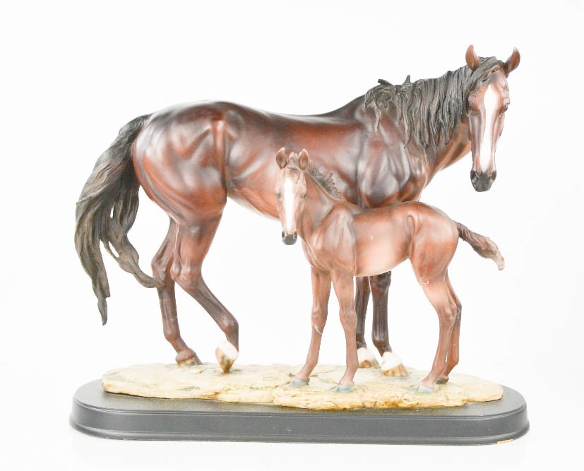 A resin study of horse and foal, stamped with Chinese symbol, 35cm high.