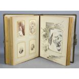 A Victorian postcard album, containing family portraits, leather bound.