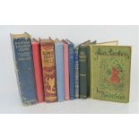 A group of collectible children's books to include A.A Milne , Lewis Carroll and Charles Dickens