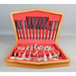 A silver plated canteen of cutlery, with red lined interior.