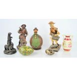 A group of collectibles to include a painted coconut box, papier-mache egg, bronze effect figure