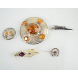 A group of Scottish brooches, to include a vintage grouse foot kilt pin, horn examples and others.