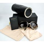 A pair of Bulgari sunglasses, with the original bag, cloth, documents, case and outer box.