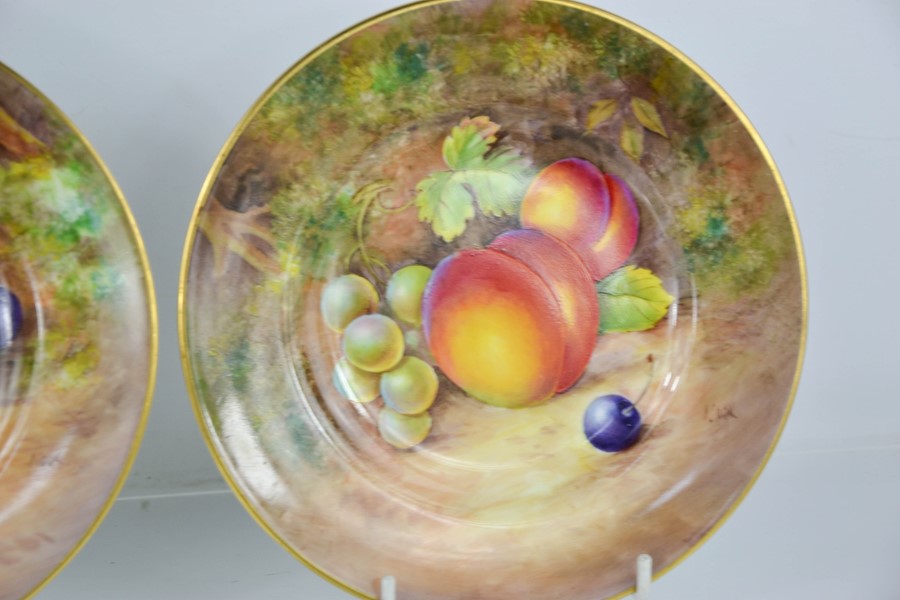A fine set of three Royal Worcester plates, painted with apples, blackberries, peaches, by J Cook, - Image 3 of 5