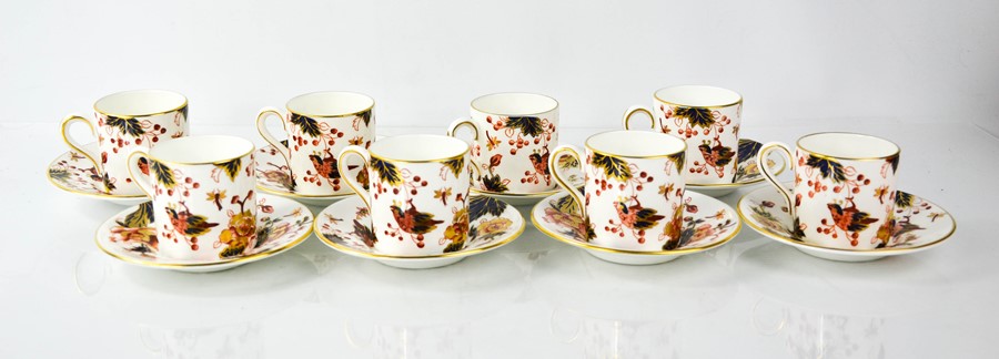 A set of eight Coalport china coffee cans and saucers.