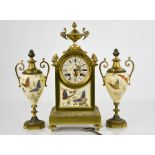 A 19th century French clock garniture comprising clock and two urns, porcelain panels decorated with