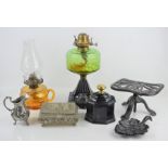 Two Victorian oil lamps together with a silver-plate jug, tobacco jar, trivet etc