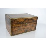 A 19th century coromandel dressing table box, with brass inlay and the lock stamped S Mordan,