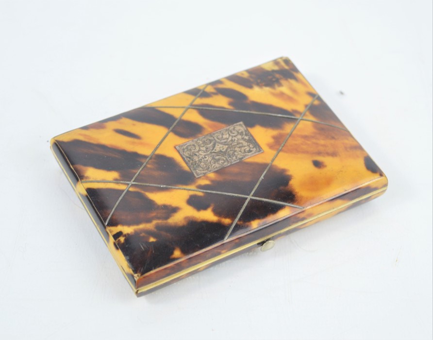 A Victorian tortoiseshell and silver inlaid card case