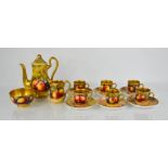 A Royal Worcester coffee set comprising six cups and saucers, milk jug, sugar bowl, coffee pot,