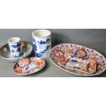 An Imari dish, together with a Chinese bowl and two blue and white Chinese vases. A/F
