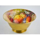 A Royal Worcester bowl, signed Ricketts, painted with grapes, flowers and apples, 14cm diameter.
