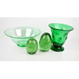 Two green glass dumps, and a mid century 'bobble' vase and bowl in green.