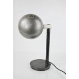 A mid-century designer table lamp, with spherical metal shade.