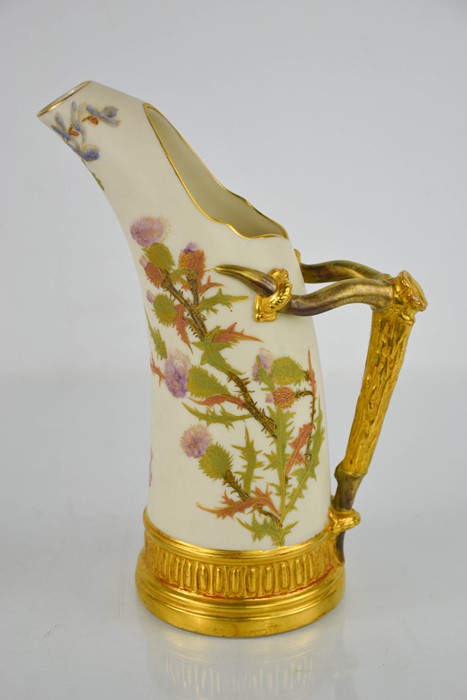 A Royal Worcester blush ivory tusk jug, painted with thistles, with gilt bark handle, date code 1889