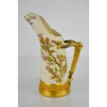 A Royal Worcester blush ivory tusk jug, painted with thistles, with gilt bark handle, date code 1889