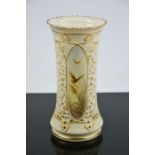 A fine Royal Worcester blush ivory vase, cylindrical form with three oval panels of painted