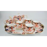 A fine Royal Crown Derby cabaret set comprising tray, milk jug, sugar bowl and cover, and four