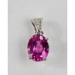 An 18ct white gold, pink sapphire and diamond pendant, the sapphire 1.96cts, the diamonds